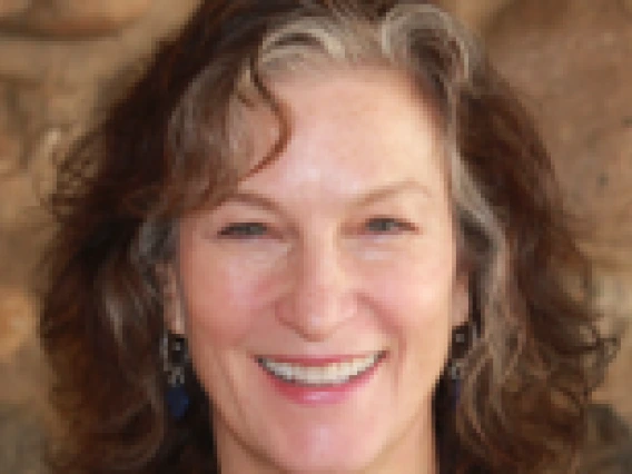 Woman smiling wearing a black shirt