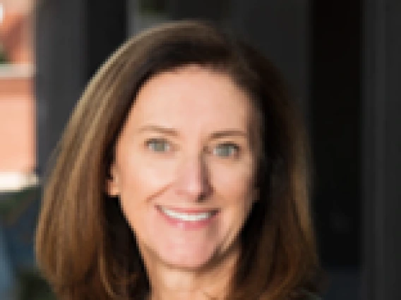 Woman wearing a dark green shirt